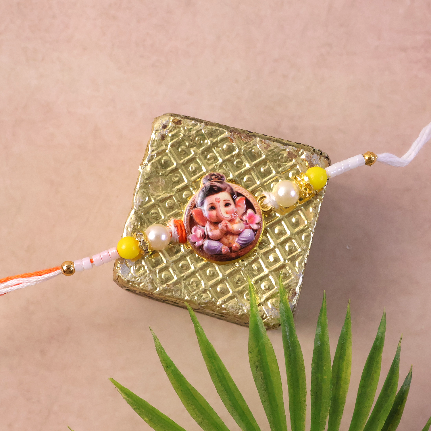 ALVENZA Ganesh Ji Rakhi – Vibrant Yellow Beads with Soft Thread for Raksha Bandhan