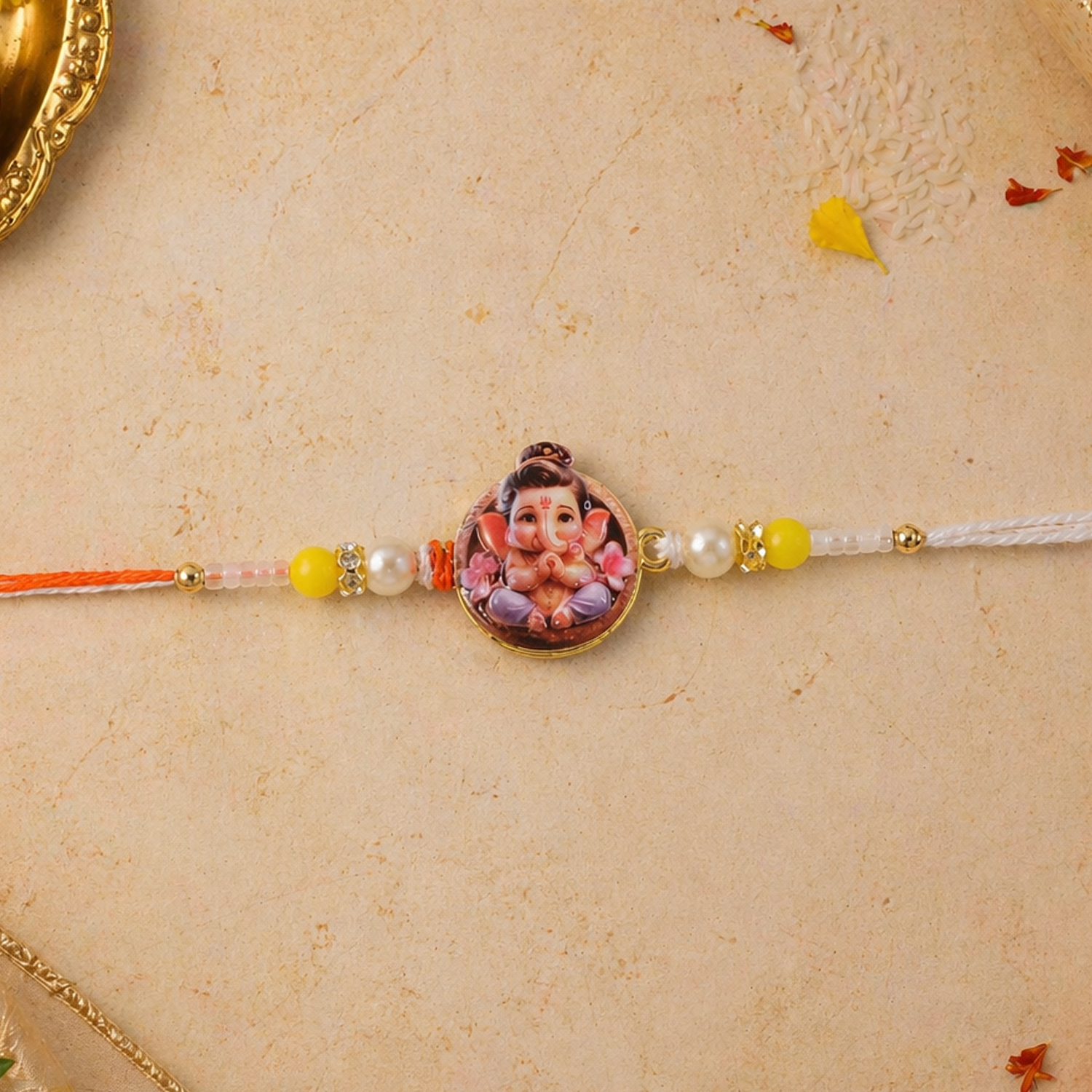 ALVENZA Ganesh Ji Rakhi – Vibrant Yellow Beads with Soft Thread for Raksha Bandhan