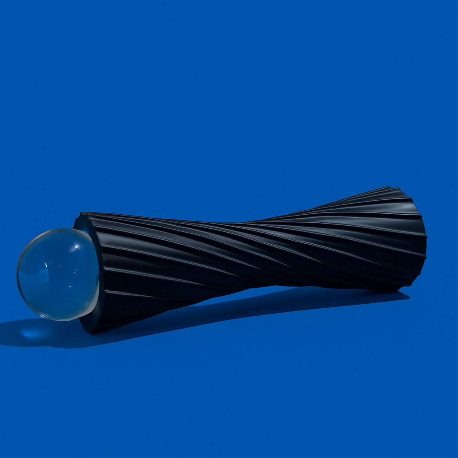ALVENZA Black Twisted Resin Showpiece with Glass Ball – Modern Elegant Accent