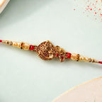 ALVENZA Golden Peacock Rakhi - Pearl Beads & Red Thread for Brother on Raksha Bandhan