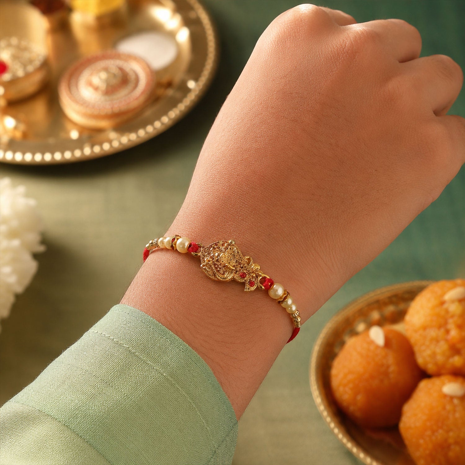 ALVENZA Golden Peacock Rakhi - Pearl Beads & Red Thread for Brother on Raksha Bandhan