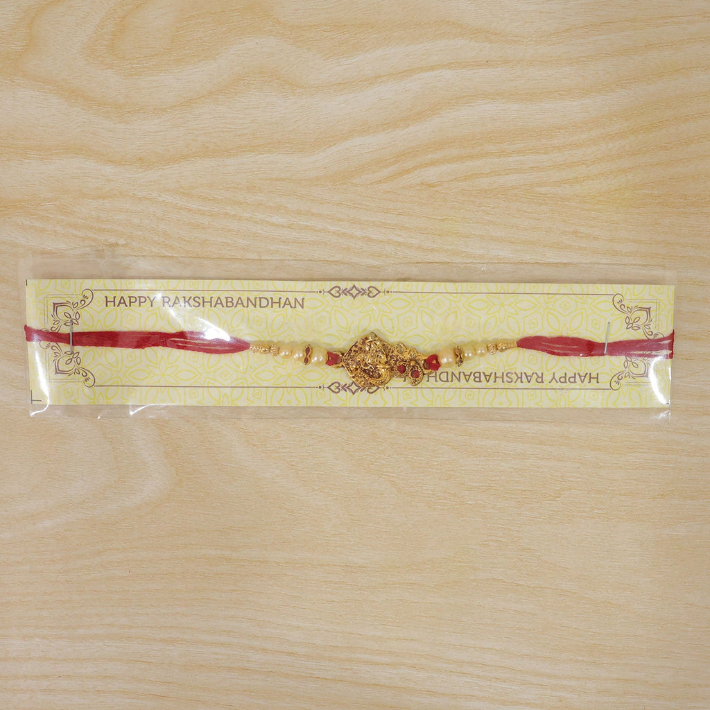 ALVENZA Golden Peacock Rakhi - Pearl Beads & Red Thread for Brother on Raksha Bandhan