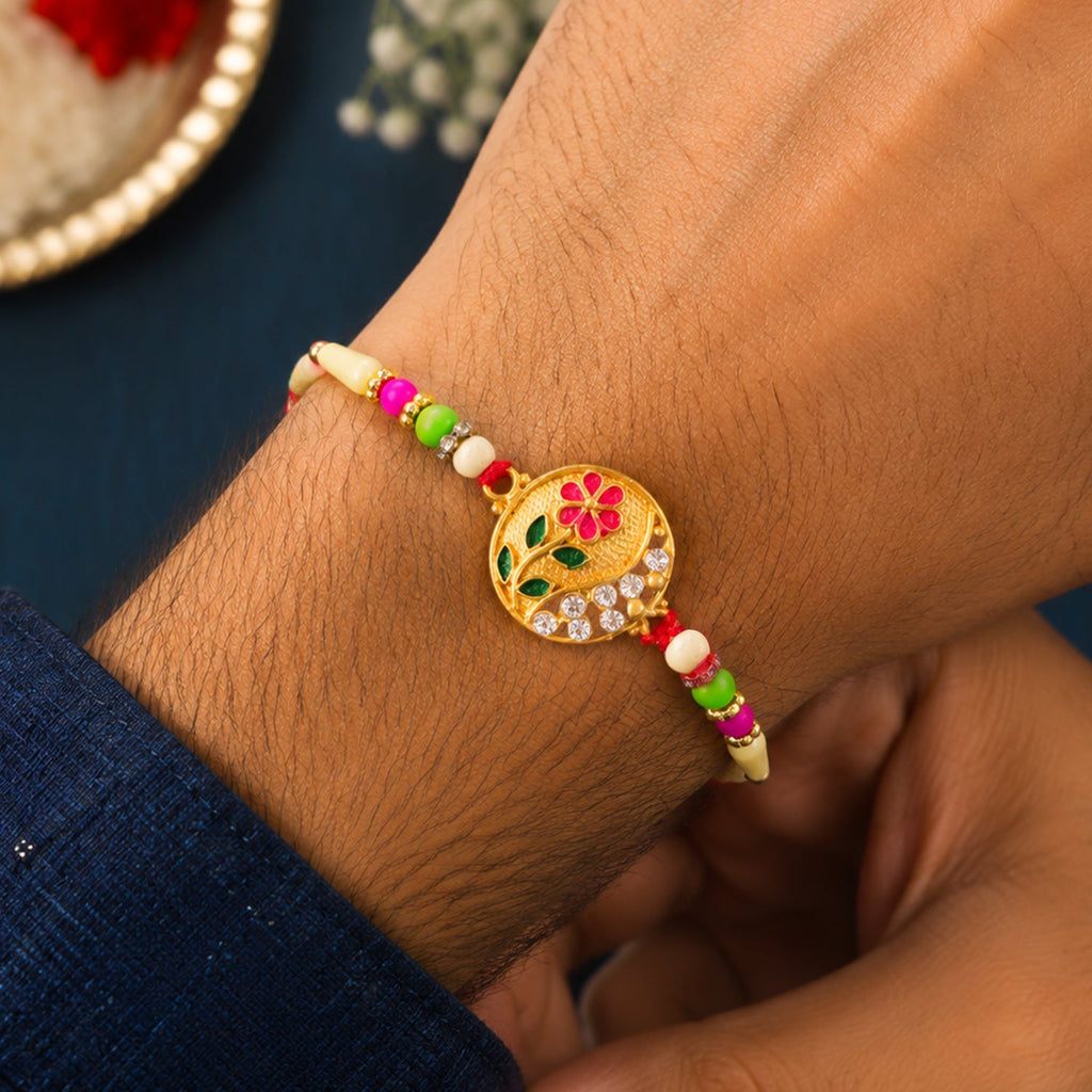 ALVENZA Flower Design Rakhi with Red and Green Beads - Festive Elegance