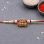 ALVENZA Golden Charm Rakhi - Pearl Beads, Red Thread for Brother