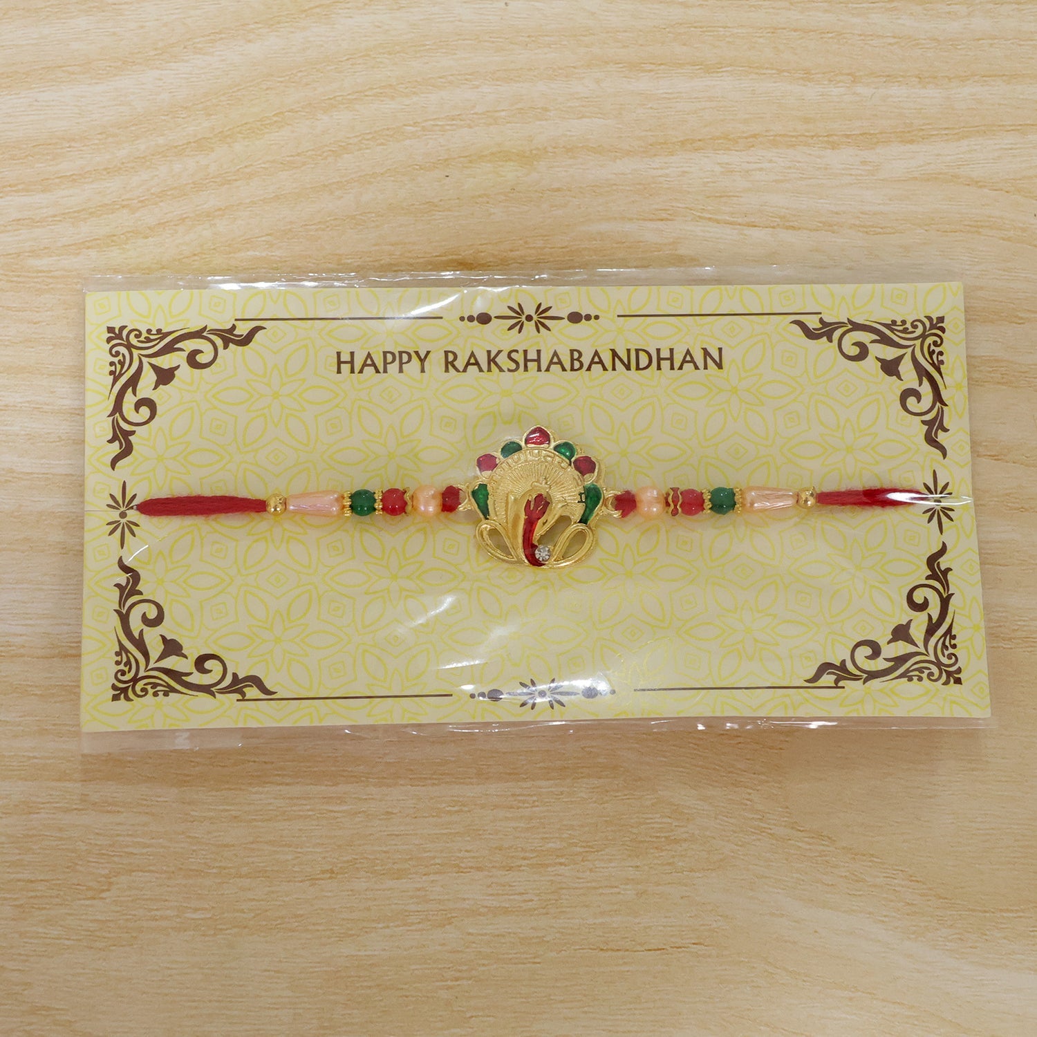 ALVENZA Buy Om Ganesha Rakhi Traditional Beadwork for Brother