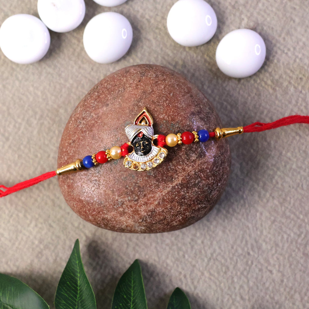 ALVENZA Traditional Krishna Rakhi – Elegant Beaded Design for Rakshabandhan