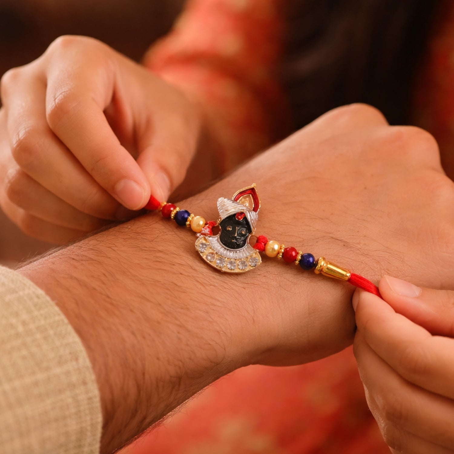 ALVENZA Traditional Krishna Rakhi – Elegant Beaded Design for Rakshabandhan