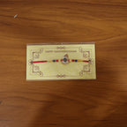 ALVENZA Traditional Krishna Rakhi – Elegant Beaded Design for Rakshabandhan