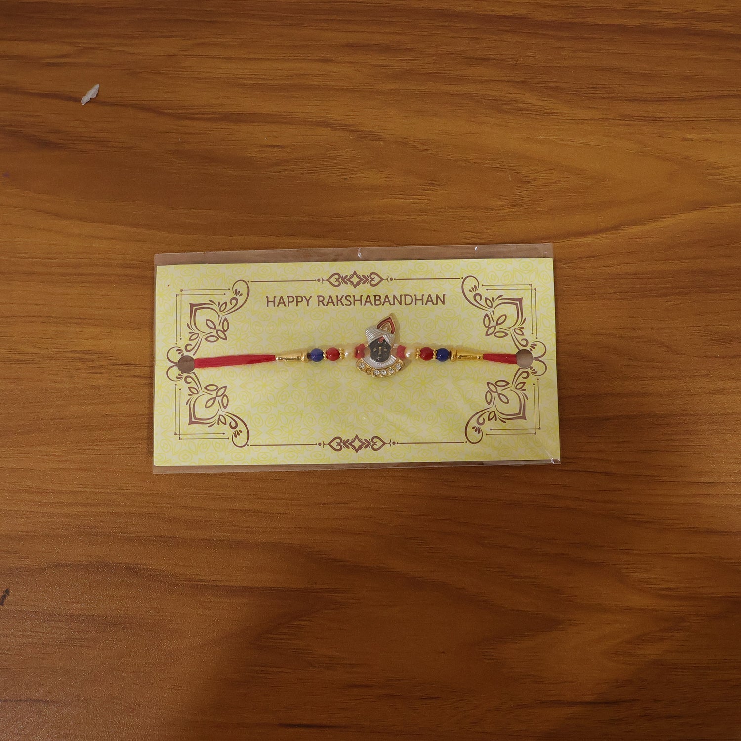 ALVENZA Traditional Krishna Rakhi – Elegant Beaded Design for Rakshabandhan