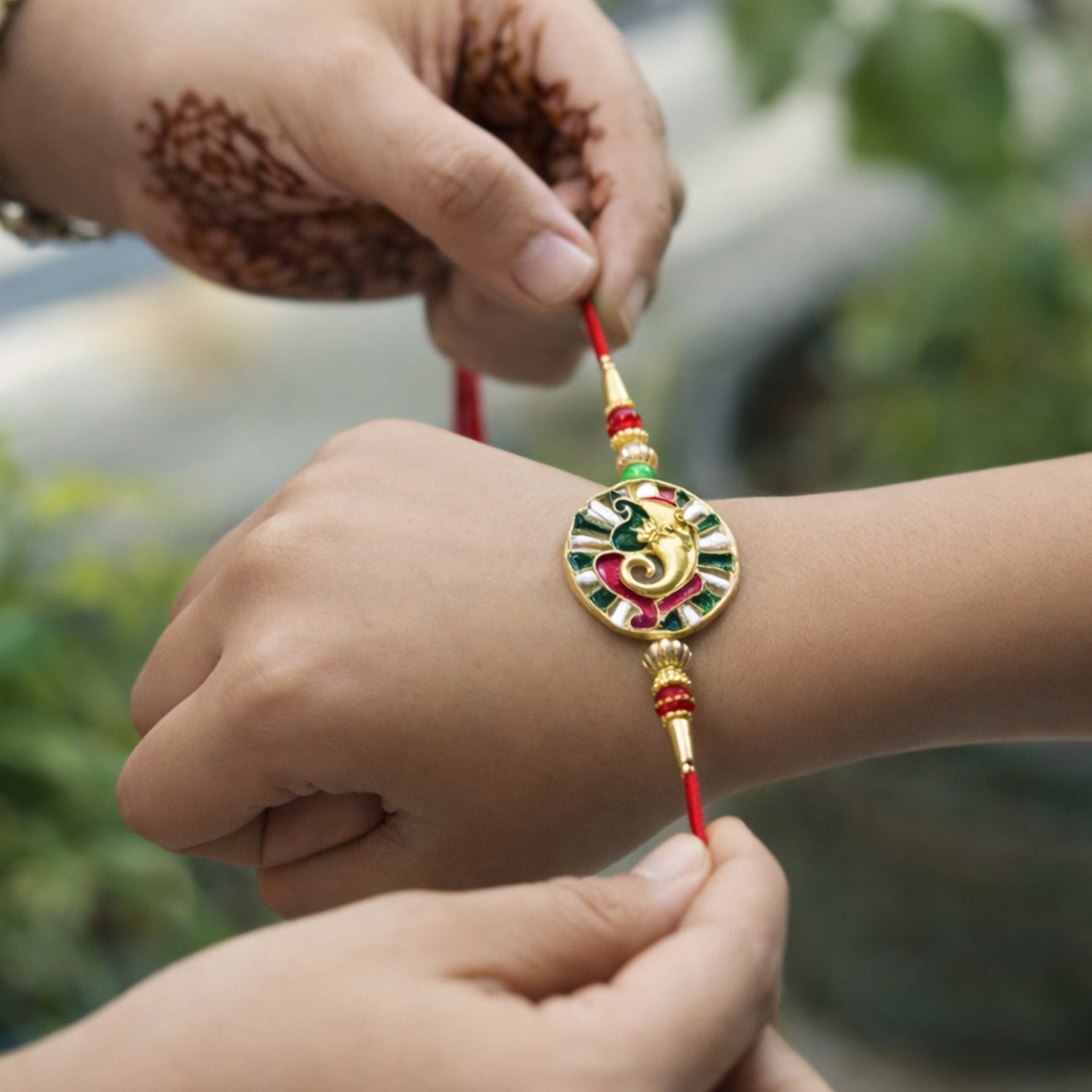 ALVENZA Ganesha Rakhi – Elegant spiritual design for Rakshabandhan