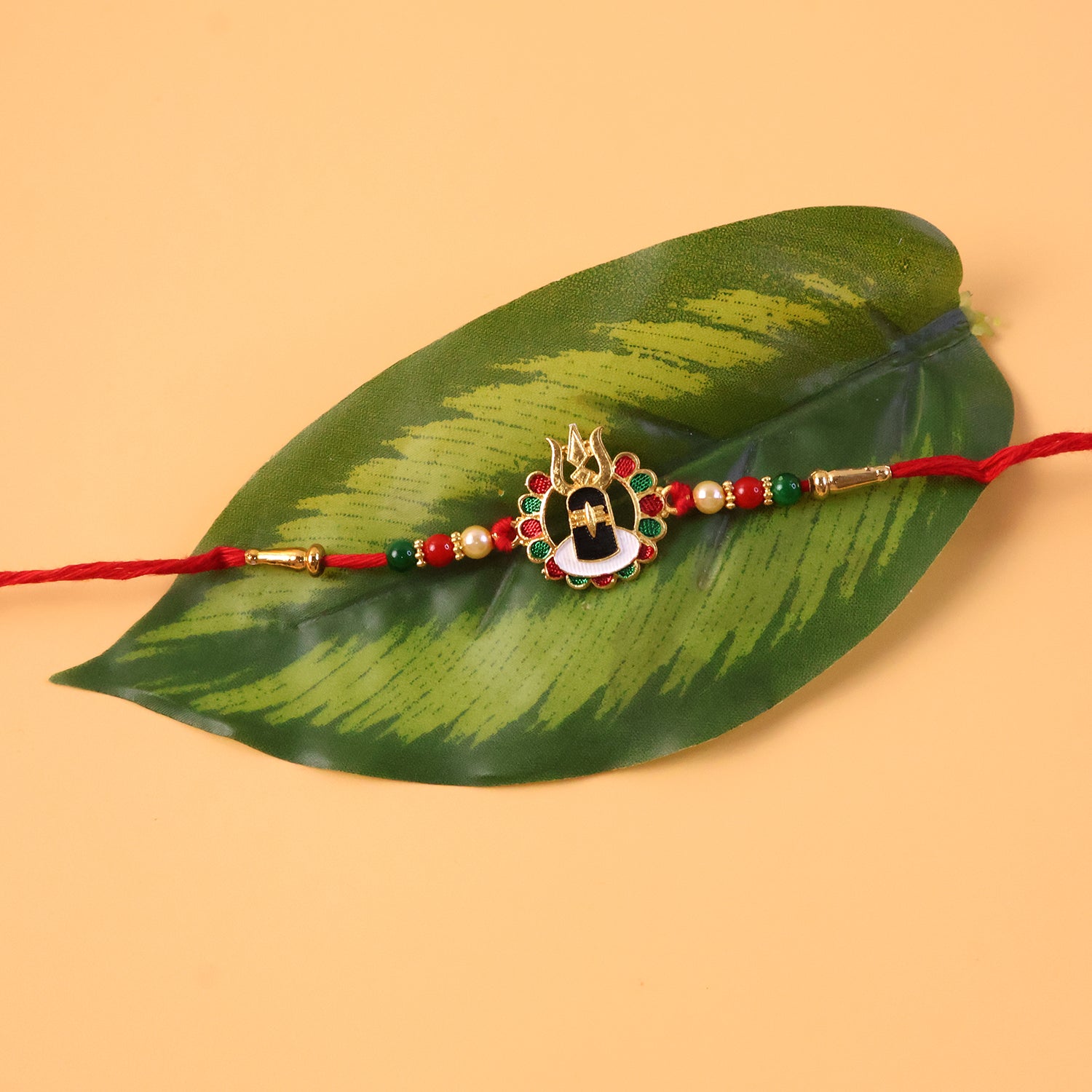 ALVENZA Divine Shivling Rakhi – Spiritual Beads & Traditional Design