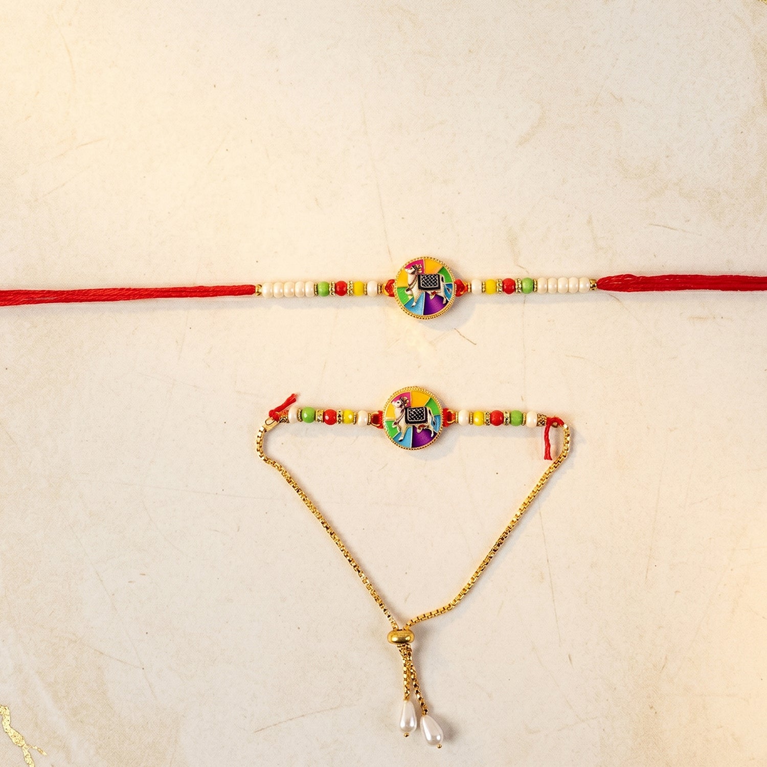 ALVENZA Premium Traditional Cow Motif lumba Rakhi – Vibrant Beads & Soft Thread Darling