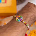 ALVENZA Premium Traditional Cow Motif lumba Rakhi – Vibrant Beads & Soft Thread Darling