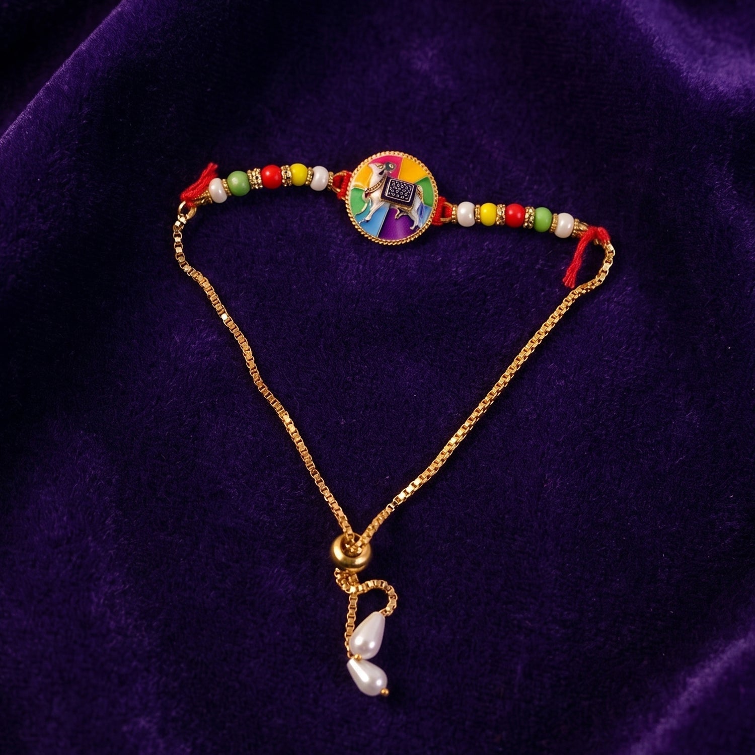 ALVENZA Premium Traditional Cow Motif lumba Rakhi – Vibrant Beads & Soft Thread Darling