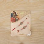 ALVENZA Premium Triangle Shape Pearl Beads lumba Rakhi – Traditional sibling gift