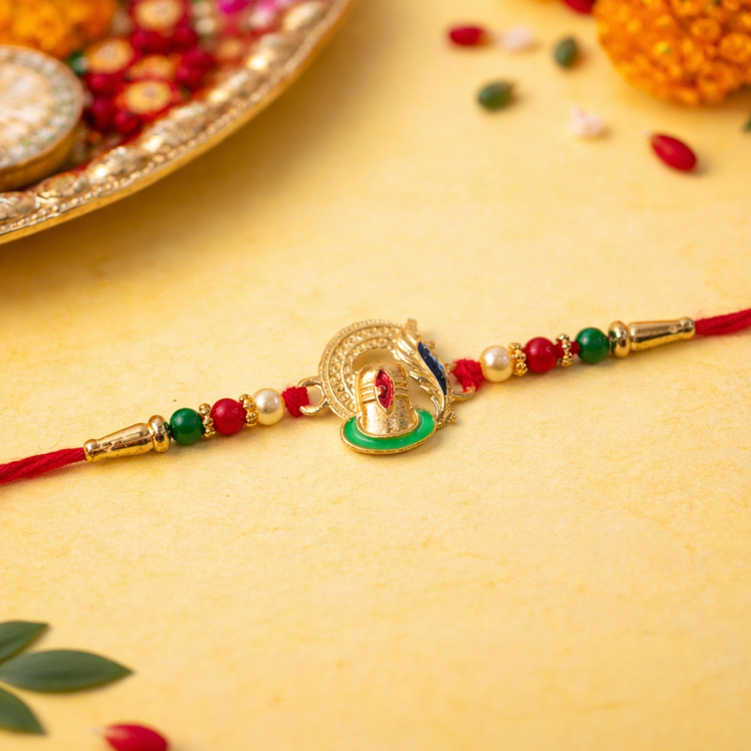 ALVENZA Ganesha Rakhi – Traditional Beaded Design for Raksha Bandhan