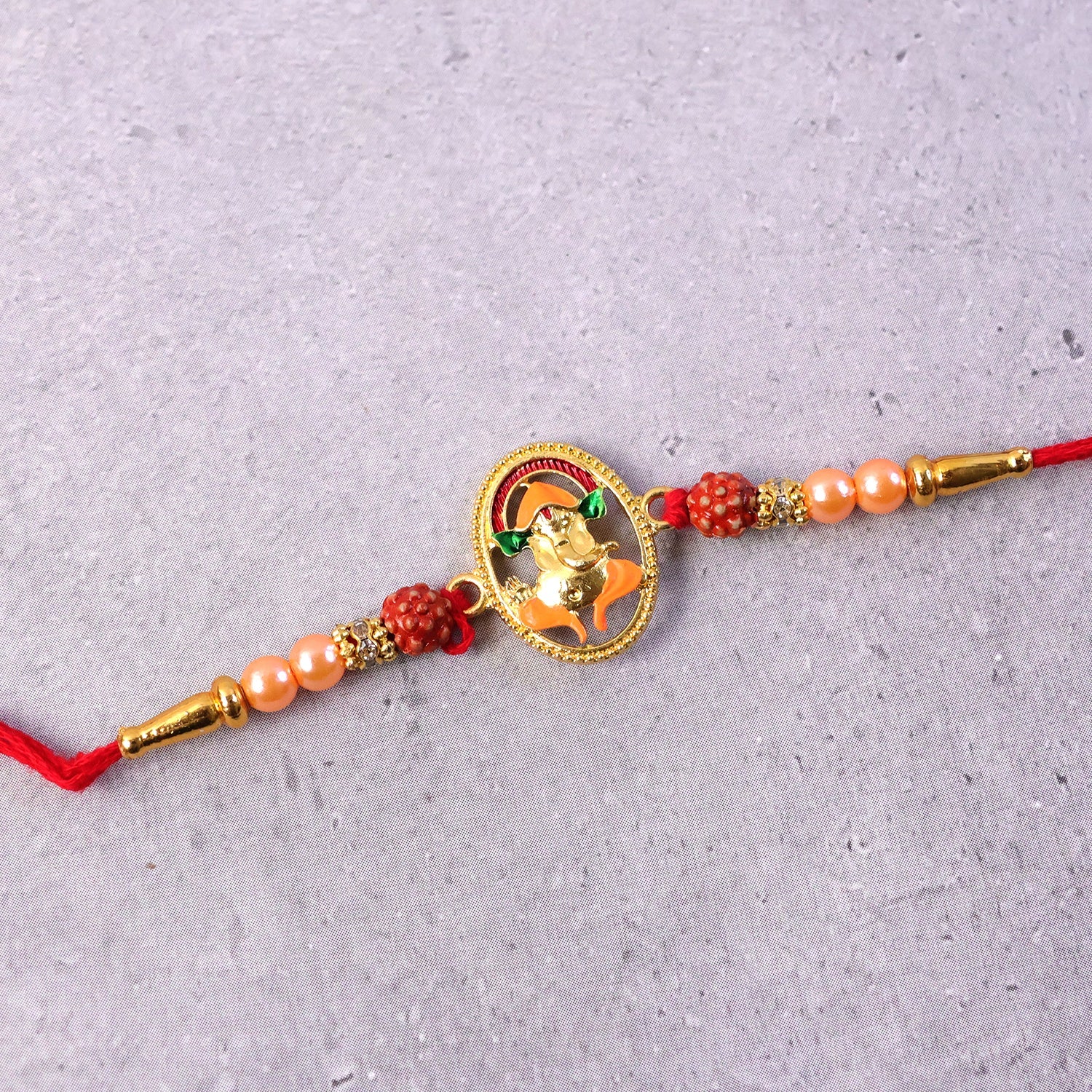 ALVENZA Traditional Ganesha Rakhi – Elegant spiritual festival accessory