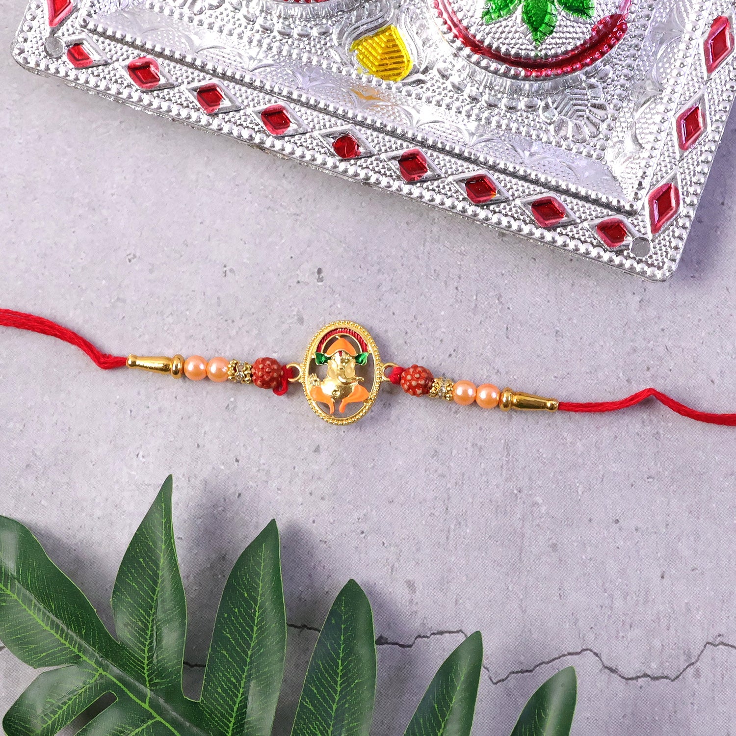 ALVENZA Traditional Ganesha Rakhi – Elegant spiritual festival accessory