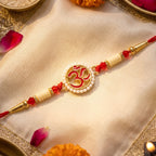 ALVENZA OM Symbol Pearl Frame Rakhi – Elegant Traditional Design for Raksha Bandhan