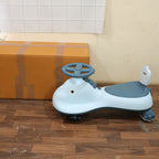 ALVENZA Kids Swing Car Ride On Toy with Music, Blue Shark Design Magic Twist Car (1 Pc)