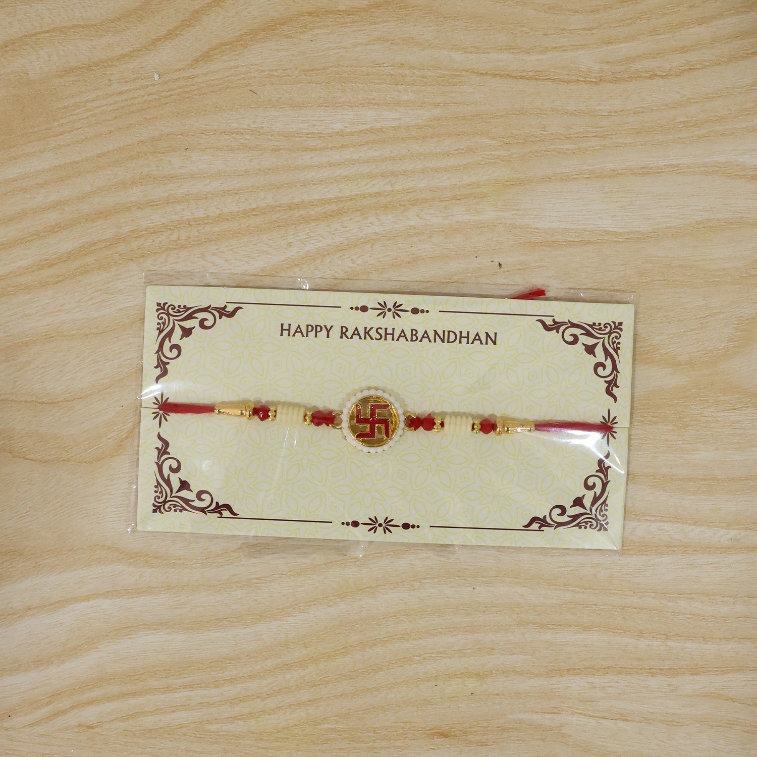 ALVENZA Swastik Pearl Frame Rakhi – Elegant and Traditional Tie for Brothers