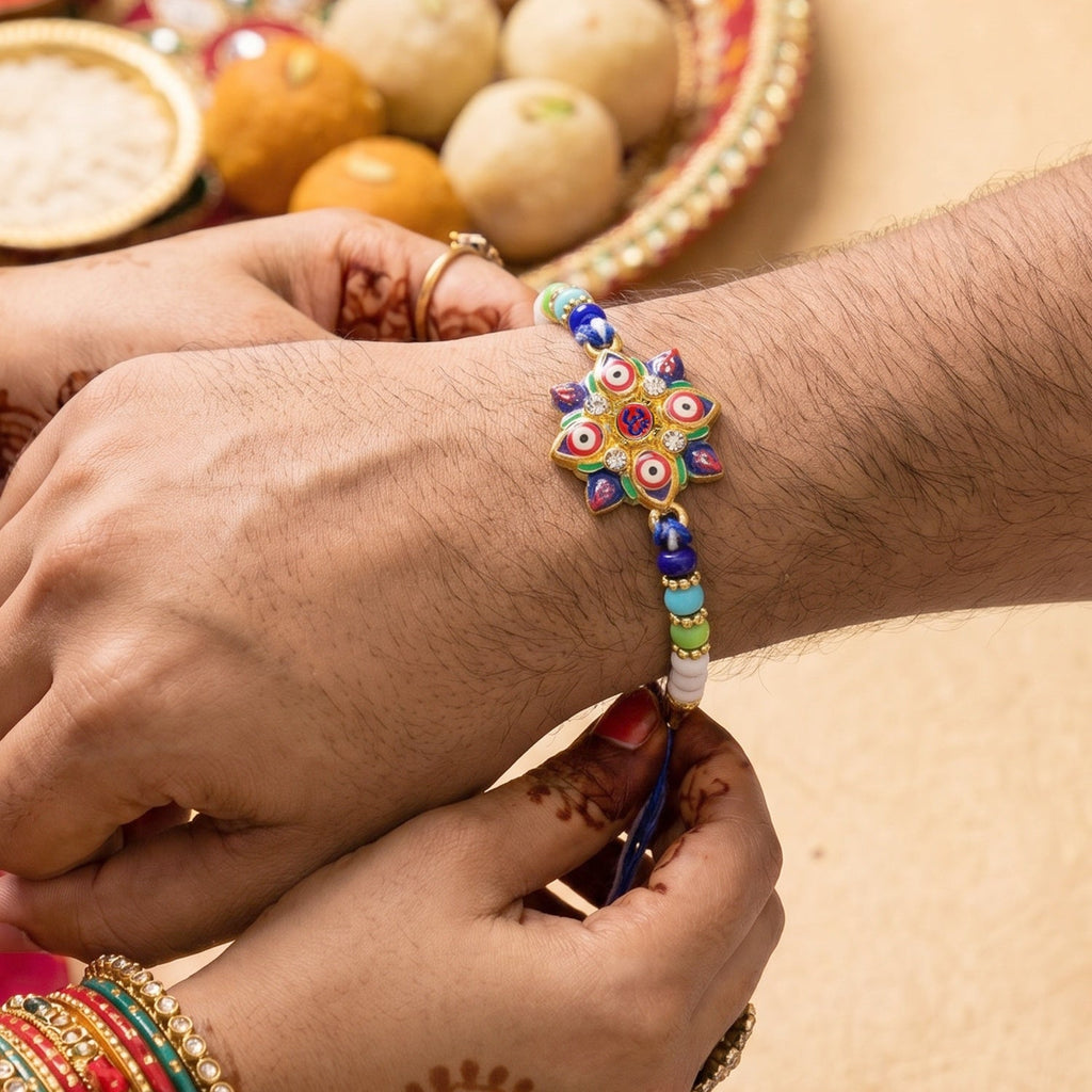 ALVENZA Evil Eye OM Star Rakhi – Symbols of Protection & Tradition