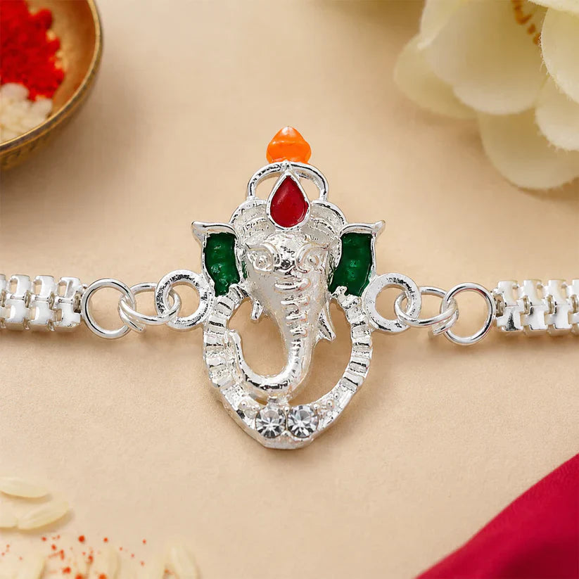 ALVENZA Shop Ganesha Rakhi with Silver Chain Enamel Highlights