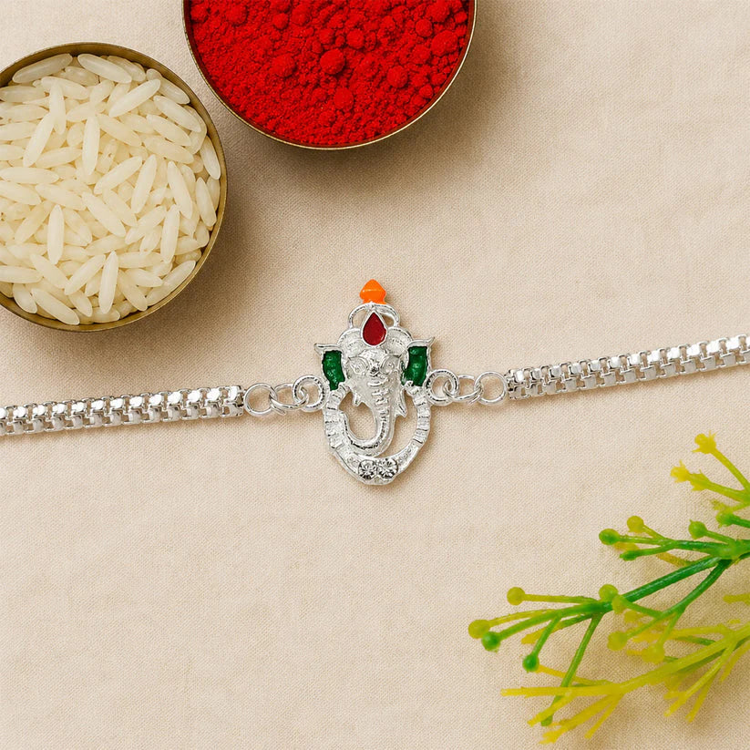 ALVENZA Shop Ganesha Rakhi with Silver Chain Enamel Highlights