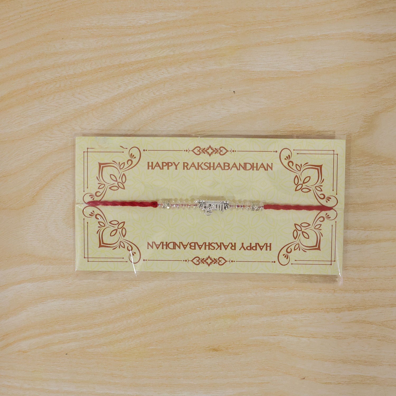 ALVENZA Silver Bhaiya Name Rakhi with Crystal Beads, Red Thread and Sparkling Detail