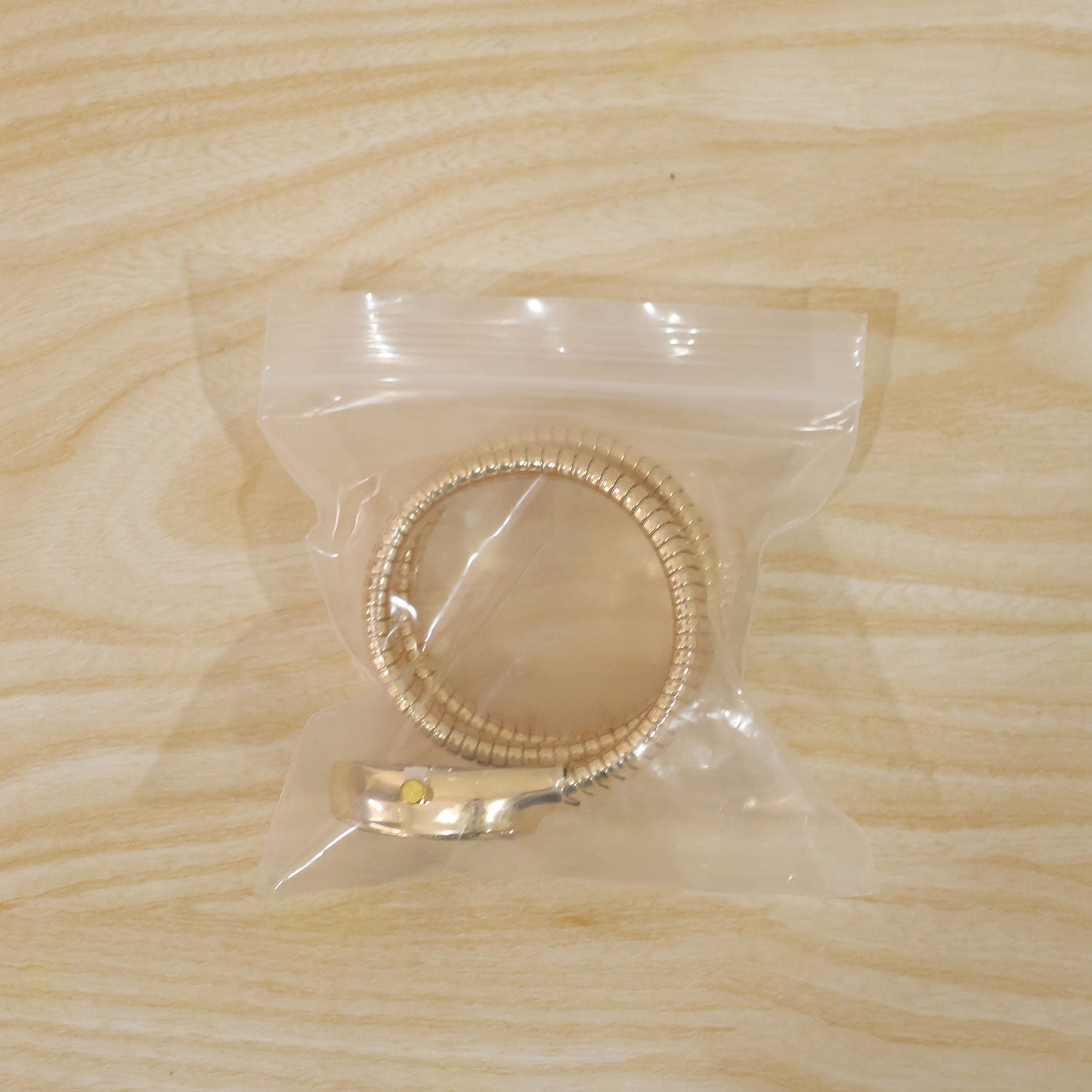 Gold Oval Snake Style Bracelet Watch with Black Dial and Crystal Border Design
