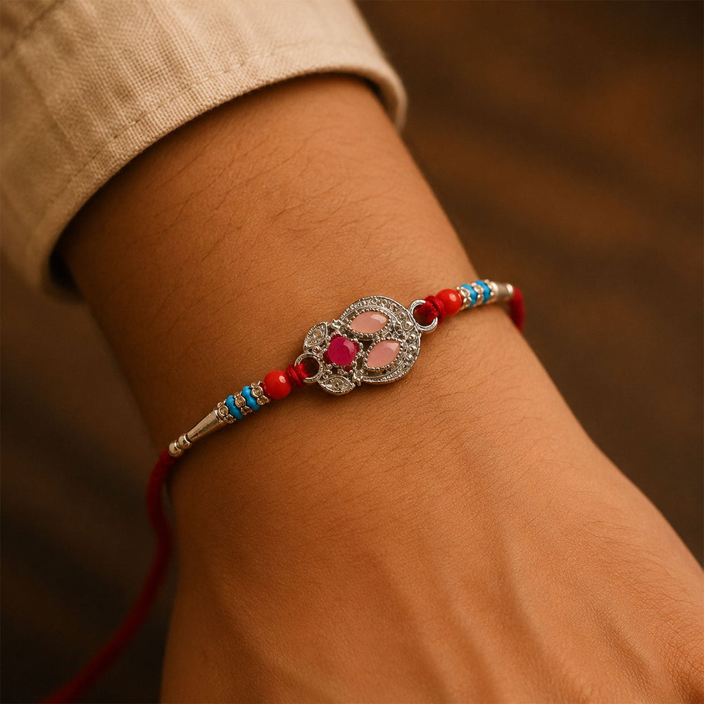 ALVENZA Oval Pink Stone Filigree Rakhi with Red Thread, Roli Chawal Coin and Gift Box Packing