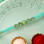 ALVENZA Beautiful Pearl and Stone Rakhi with Bright Beads and Elegant Raksha Bandhan Look