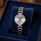 Minimal Silver Dial Women's Watch – Elegant & Versatile Accessory