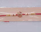 ALVENZA Om Swastik Rakhi - Golden Motif with Pearl Beads for Brother