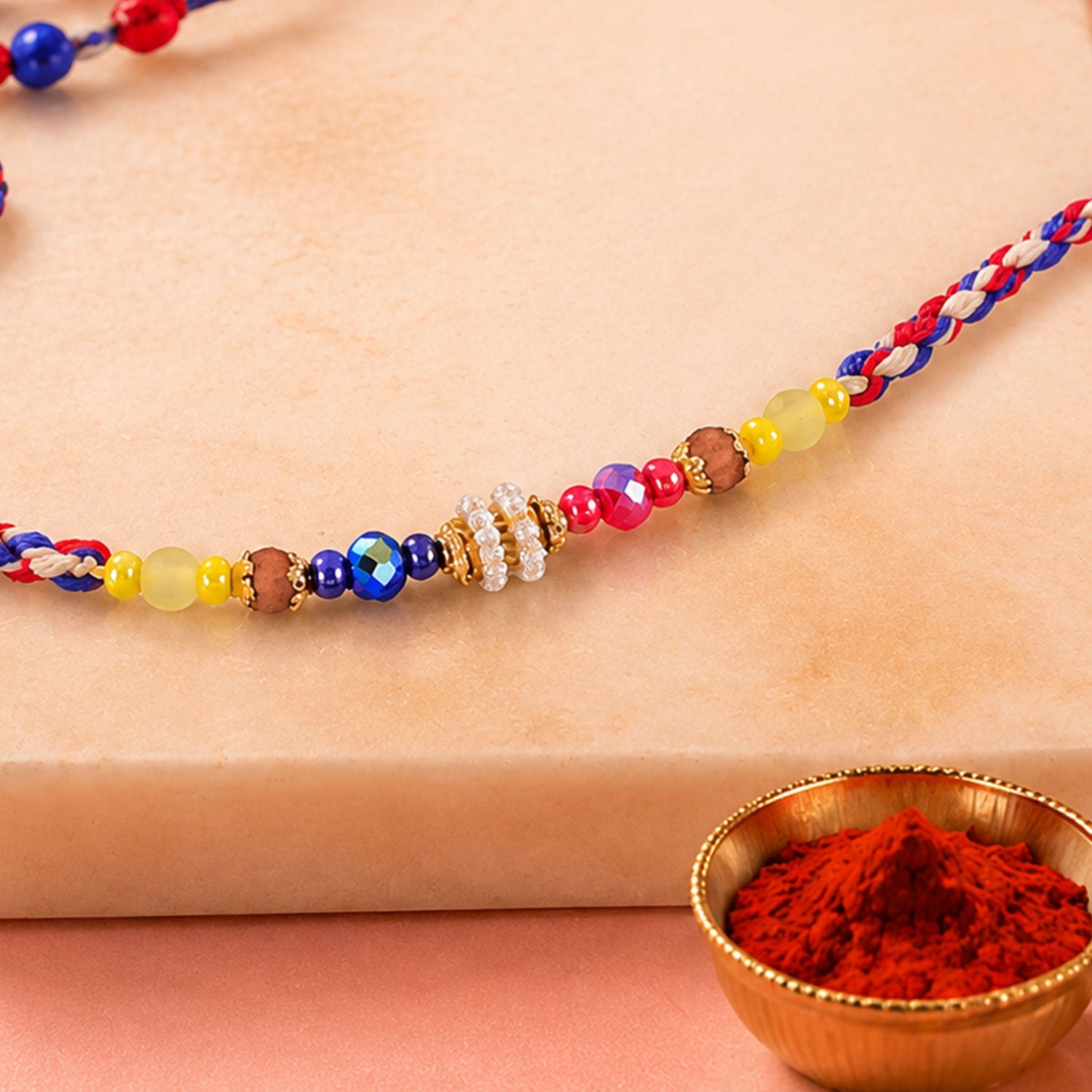 ALVENZA Rainbow Beaded Charm Rakhi with Colorful Festive Style and Playful Bracelet Look