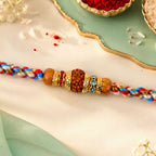 ALVENZA Graceful Pastel Pearl Rakhi with Fine Beads and Premium Raksha Bandhan Charm