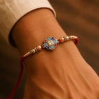 ALVENZA Blue Enamel Mandala Rakhi with Golden Star Detail, Roli Chawal Coin and Gift Box Packing