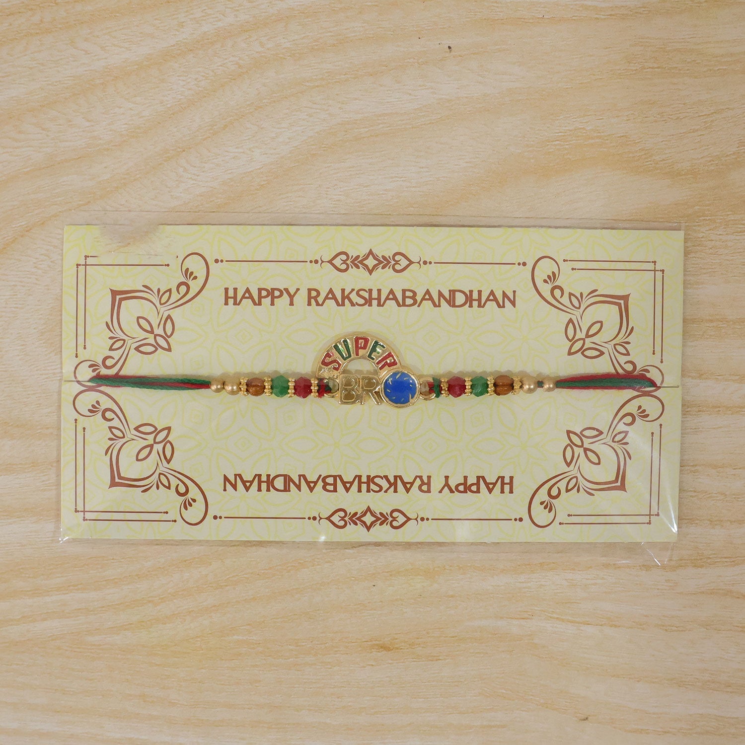 ALVENZA Super Bro Golden Rakhi with Colorful Beads, Blue Charm and Premium Festive Look