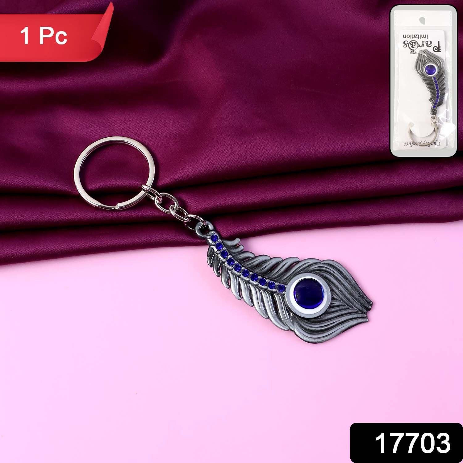 ALVENZA Peacock Feather Keychain – Elegant Metal with Blue Gem Accent