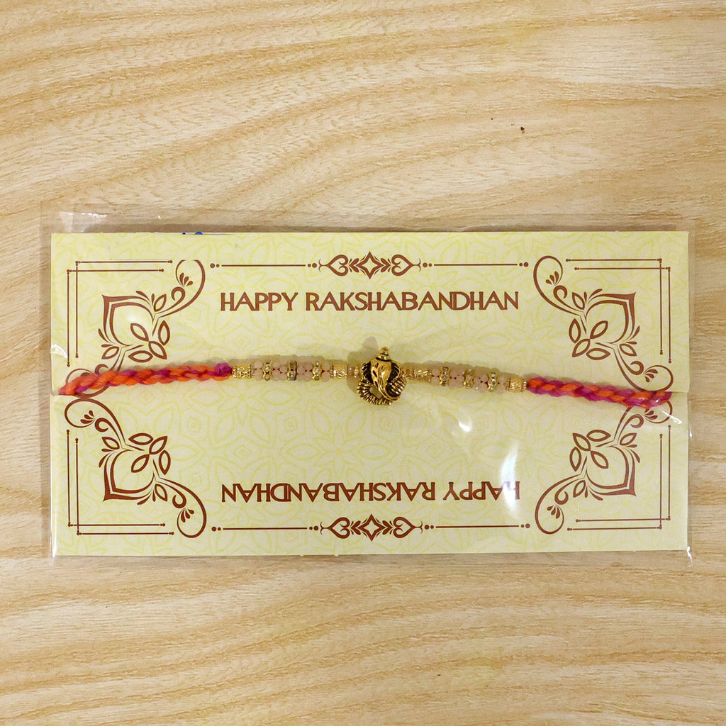 ALVENZA Silver Tone Designer Rakhi with Pastel Beads and Elegant Bracelet Style Finish