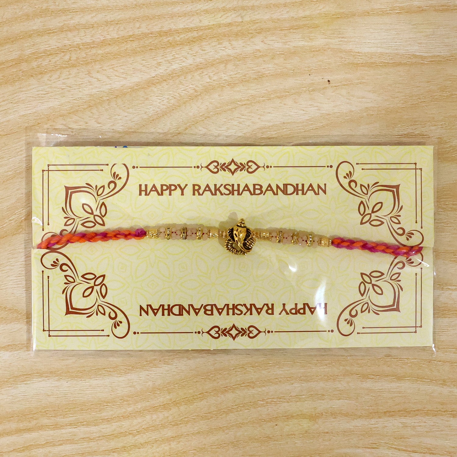 ALVENZA Silver Tone Designer Rakhi with Pastel Beads and Elegant Bracelet Style Finish