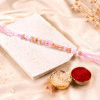ALVENZA Soft Pearl Beaded Rakhi with Delicate Colors and Beautiful Bracelet Style Finish