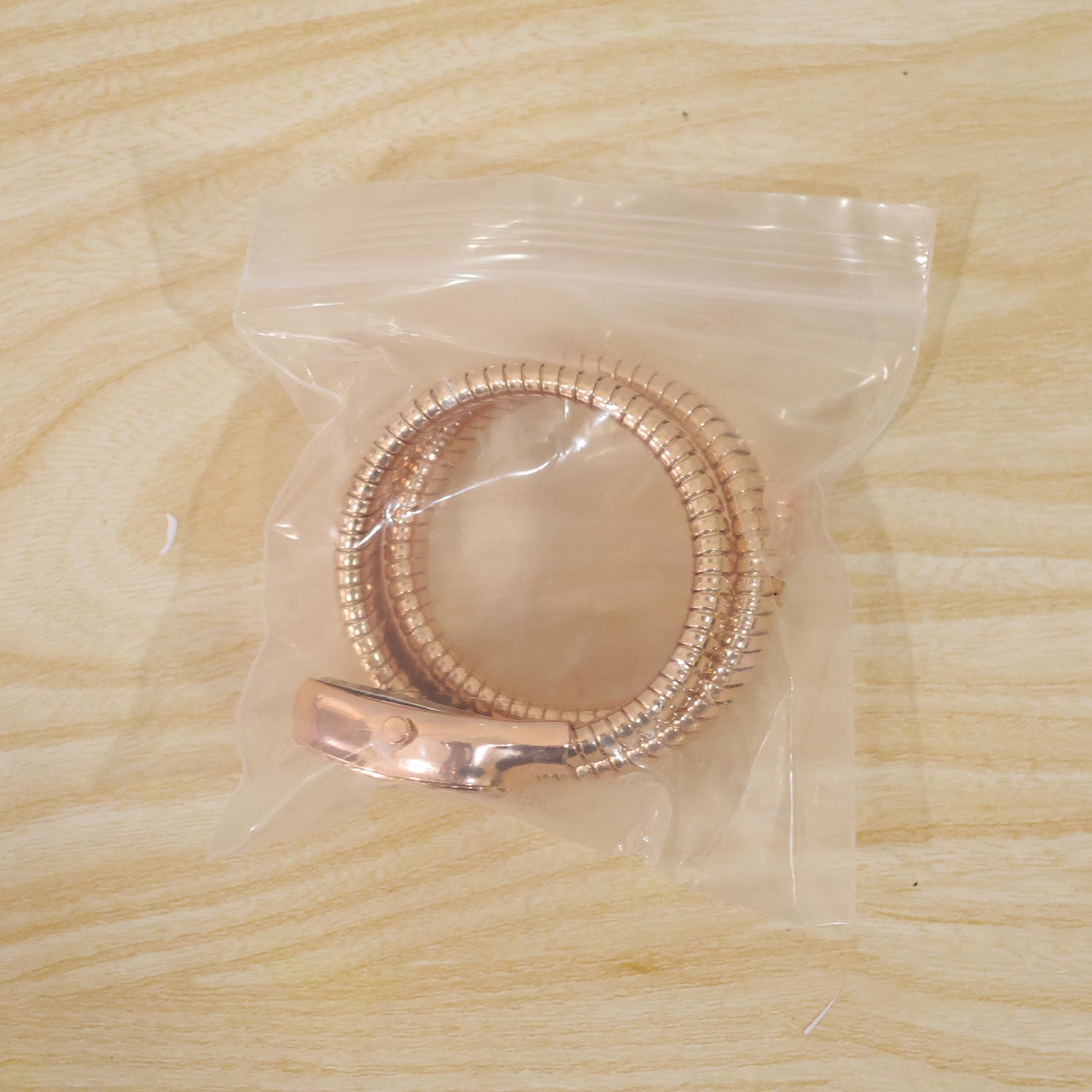 Rose Gold Oval Snake Style Bracelet Watch with Crystal Dial Border Design
