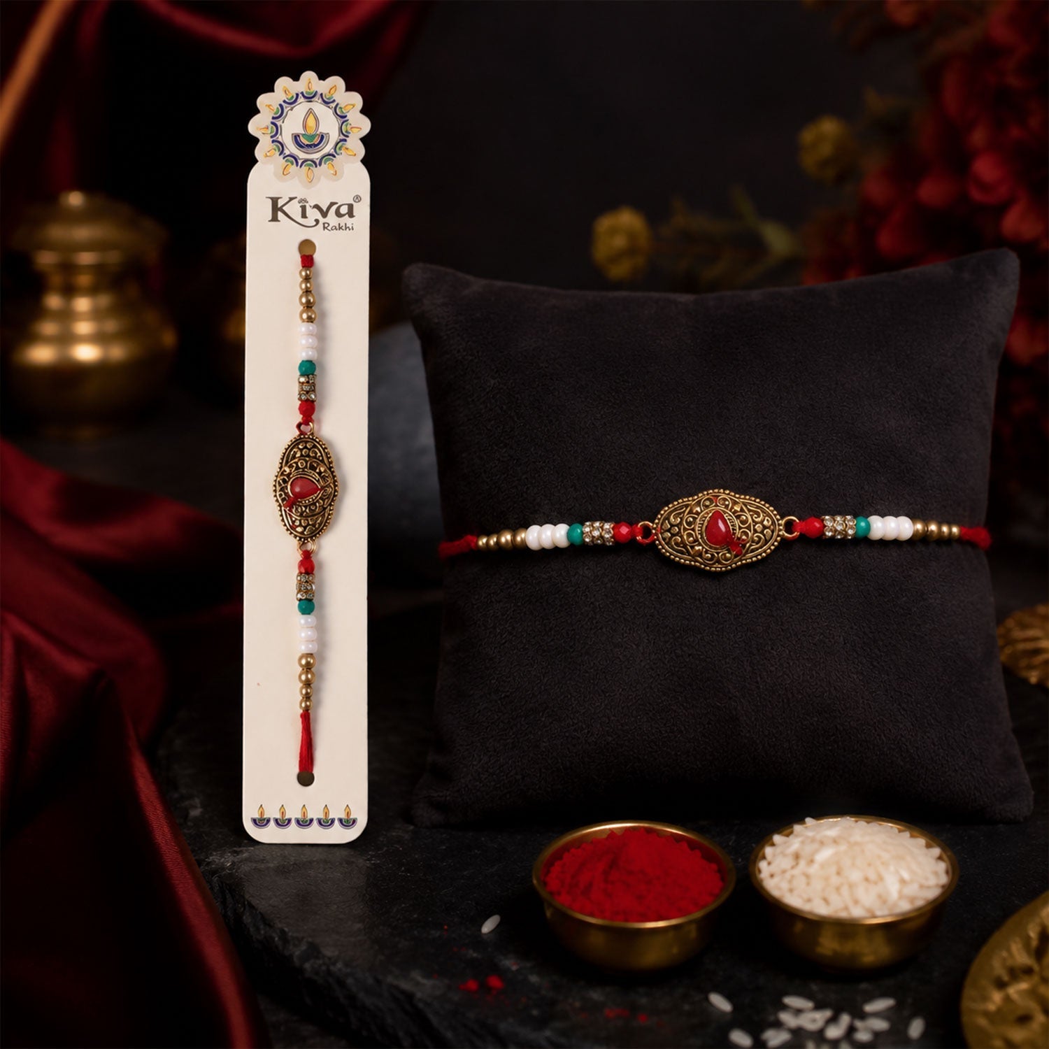 ALVENZA Antique Gold Oval Filigree Rakhi with Red Teardrop Stone, Pearl & Multicolor Beads