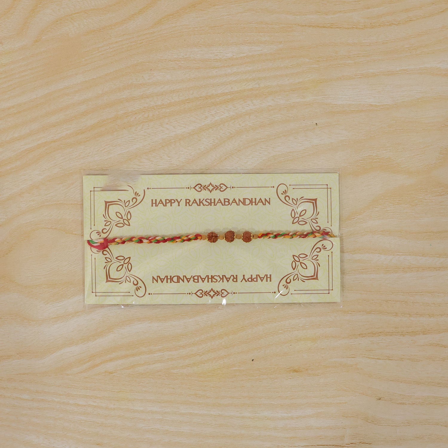 ALVENZA Rudraksha Style Devotional Rakhi with Braided Red Green Yellow Thread and Wooden Beads