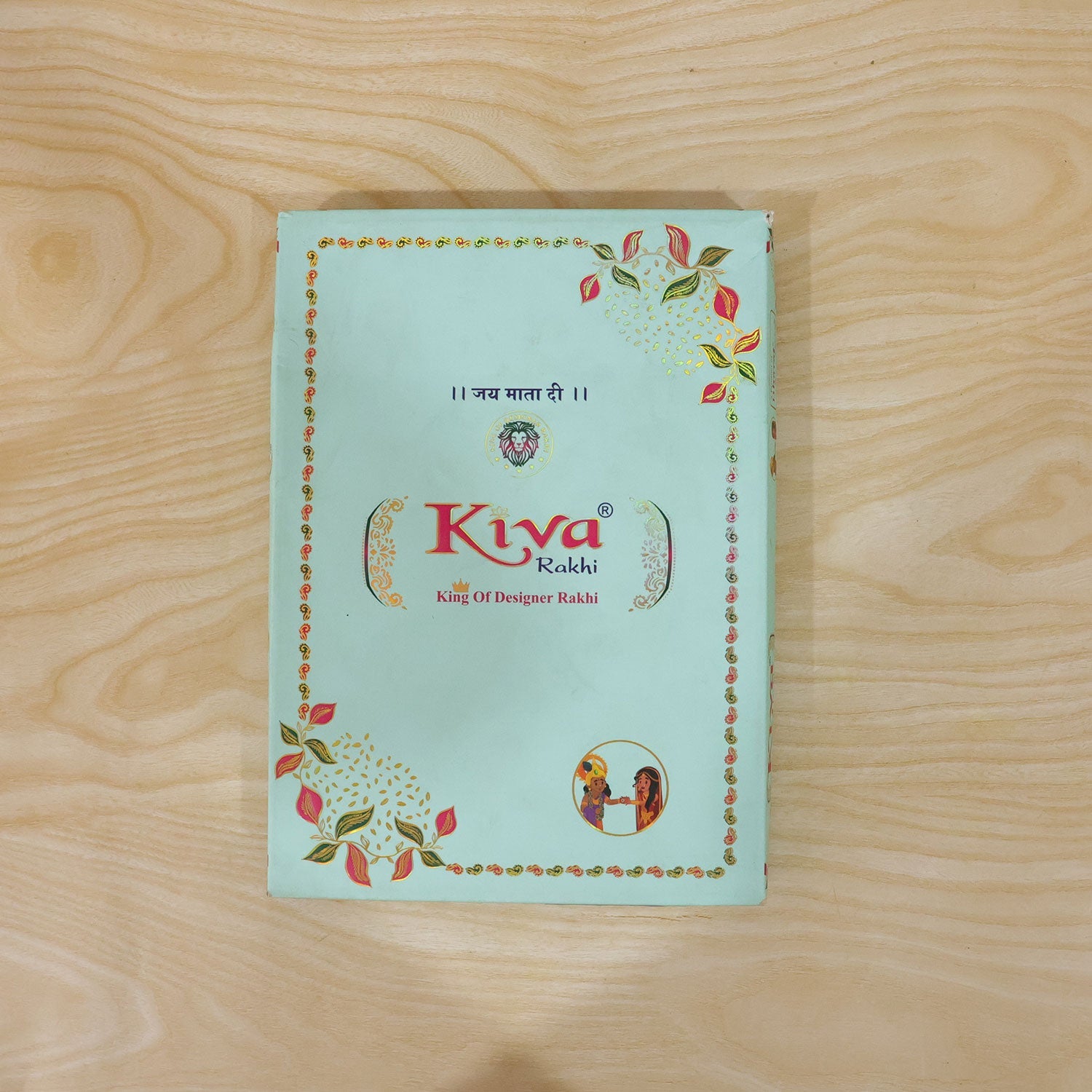 ALVENZA Silver Floral Stone Rakhi with Royal Blue Thread, Roli Chawal Coin and Card Gift Packing