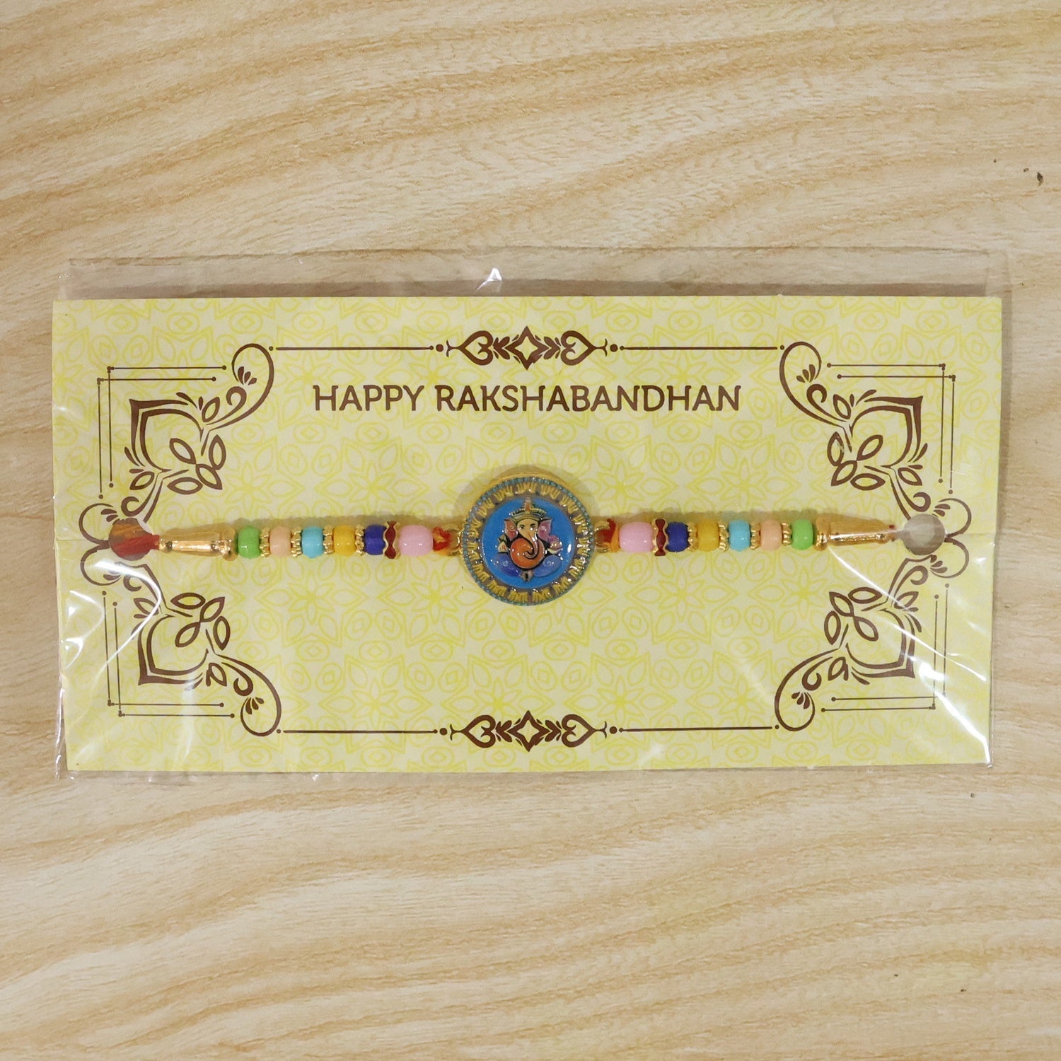 ALVENZA Shop Lord Ganesha Round Coin Designer Rakhi for Raksha Bandhan