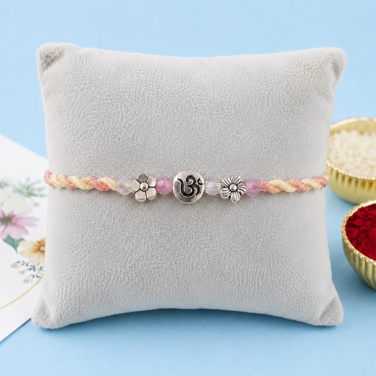 ALVENZA Graceful Pastel Bracelet Rakhi with Silver Centre and Delicate Raksha Bandhan Beauty