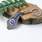 ALVENZA Peacock Feather Keychain – Elegant Metal with Blue Gem Accent