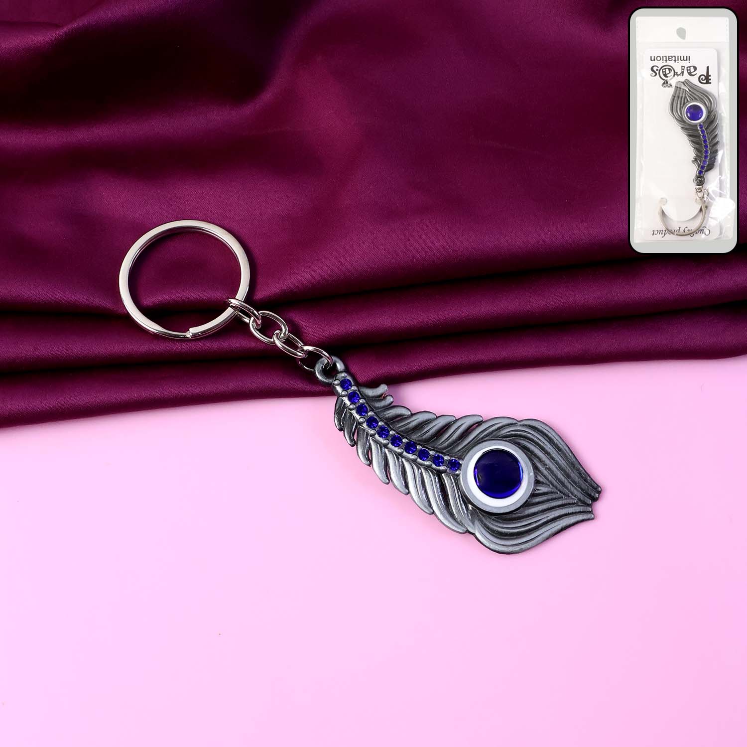 ALVENZA Peacock Feather Keychain – Elegant Metal with Blue Gem Accent